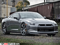 2008 Nissan GT-R = 310 kph, 480 bhp, 3.9 sec.